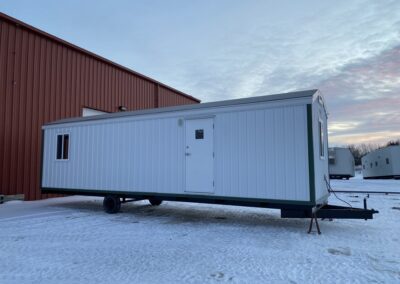 exterior of mobile office, white with black trim