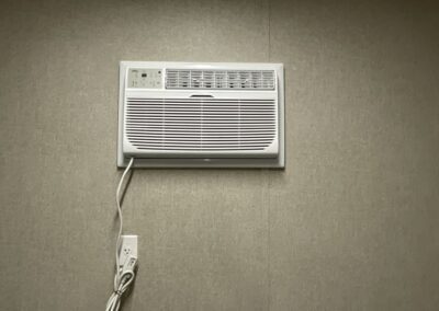 air conditioner in wall of mobile office