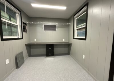 office area with file cabinet, sized for two users